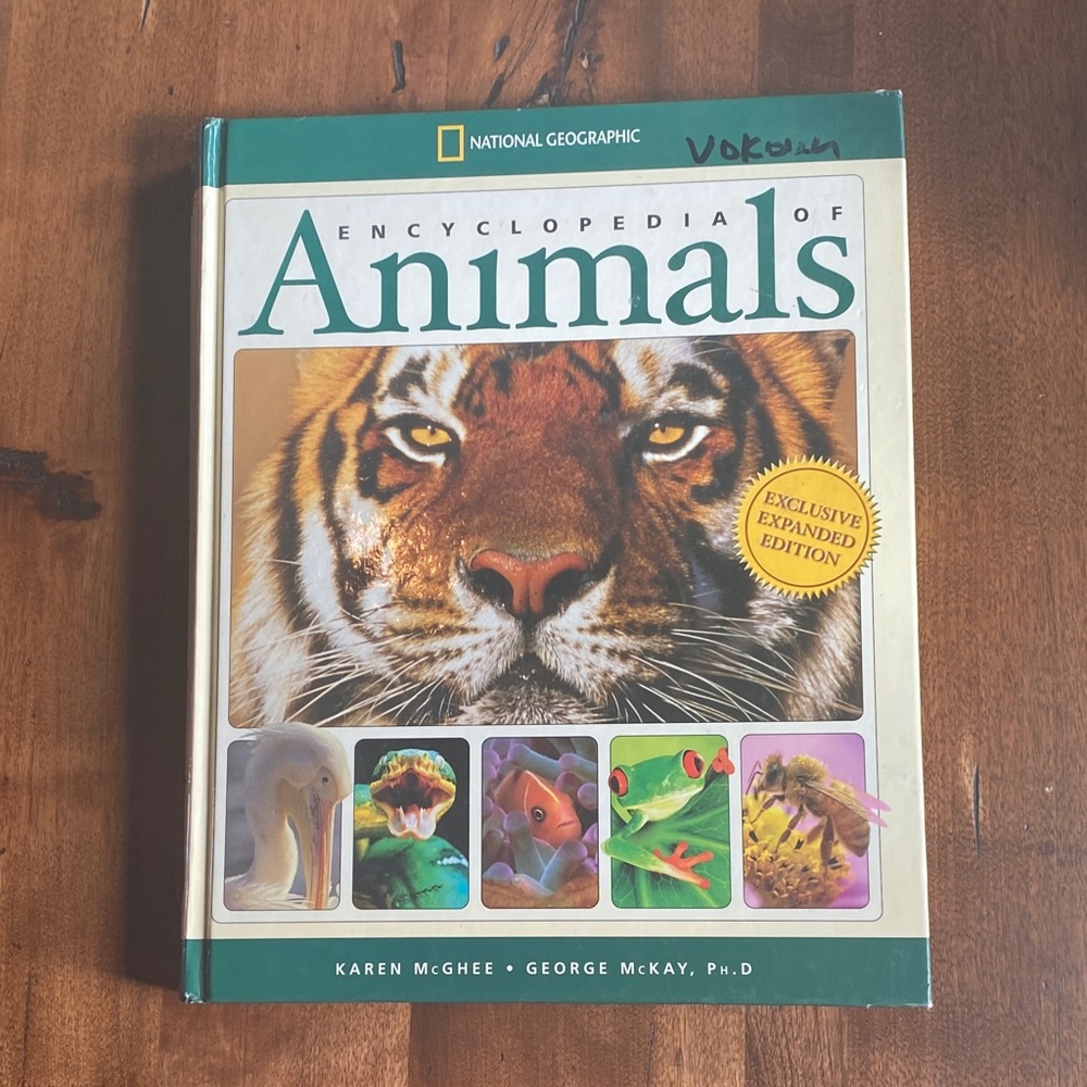 Hard cover National Geographic Animal Encyclopedia - Gold and Green Cover